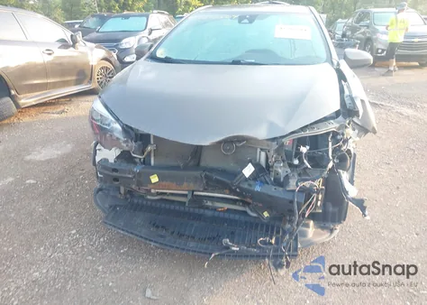 2017 Toyota Corolla Le z USA, uszkodzony, nr VIN 5YFBURHE4HP702843